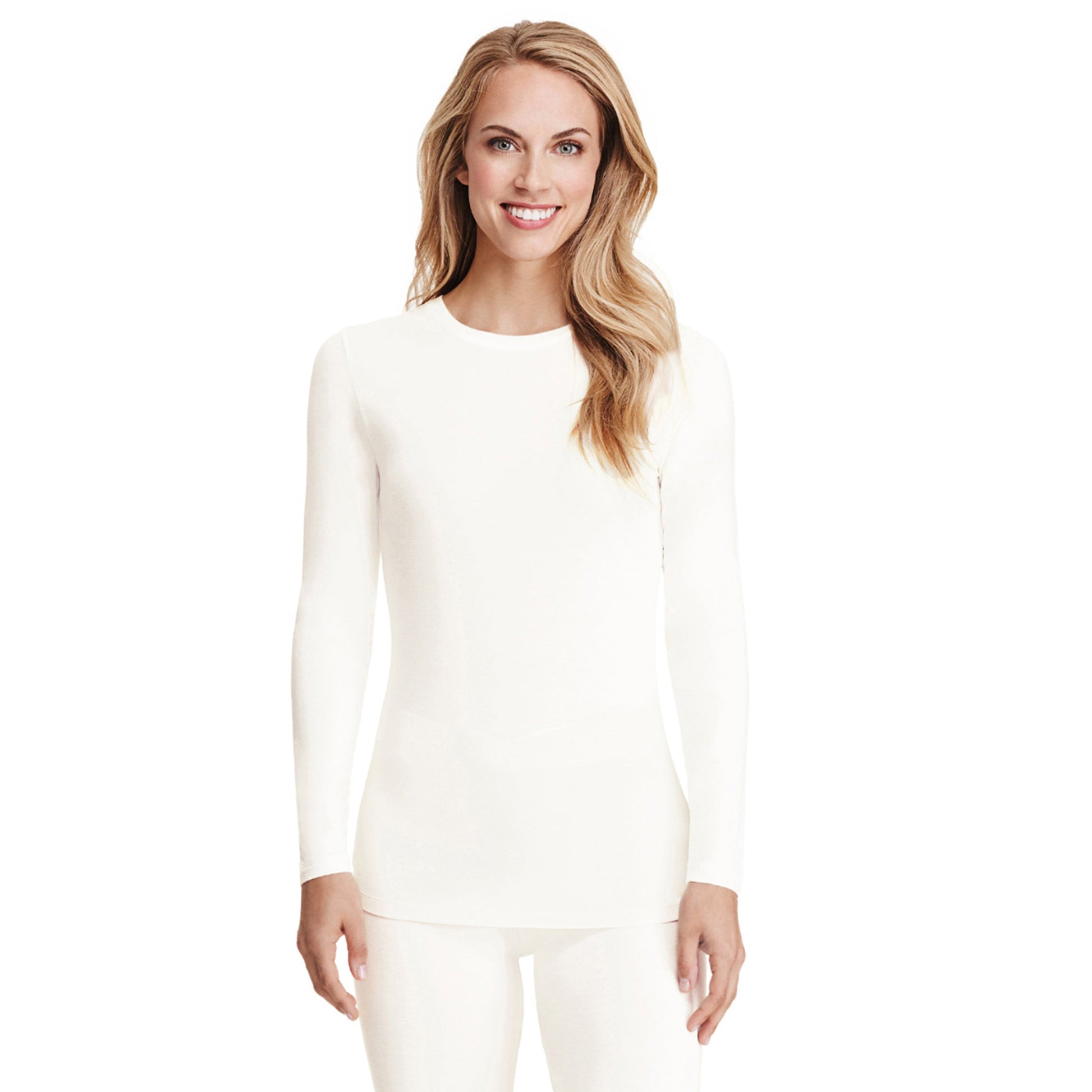 A lady wearing a ivory long sleeve stretch crew.