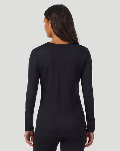 A lady wearing Softwear Long Sleeve Crew in Black back view back view