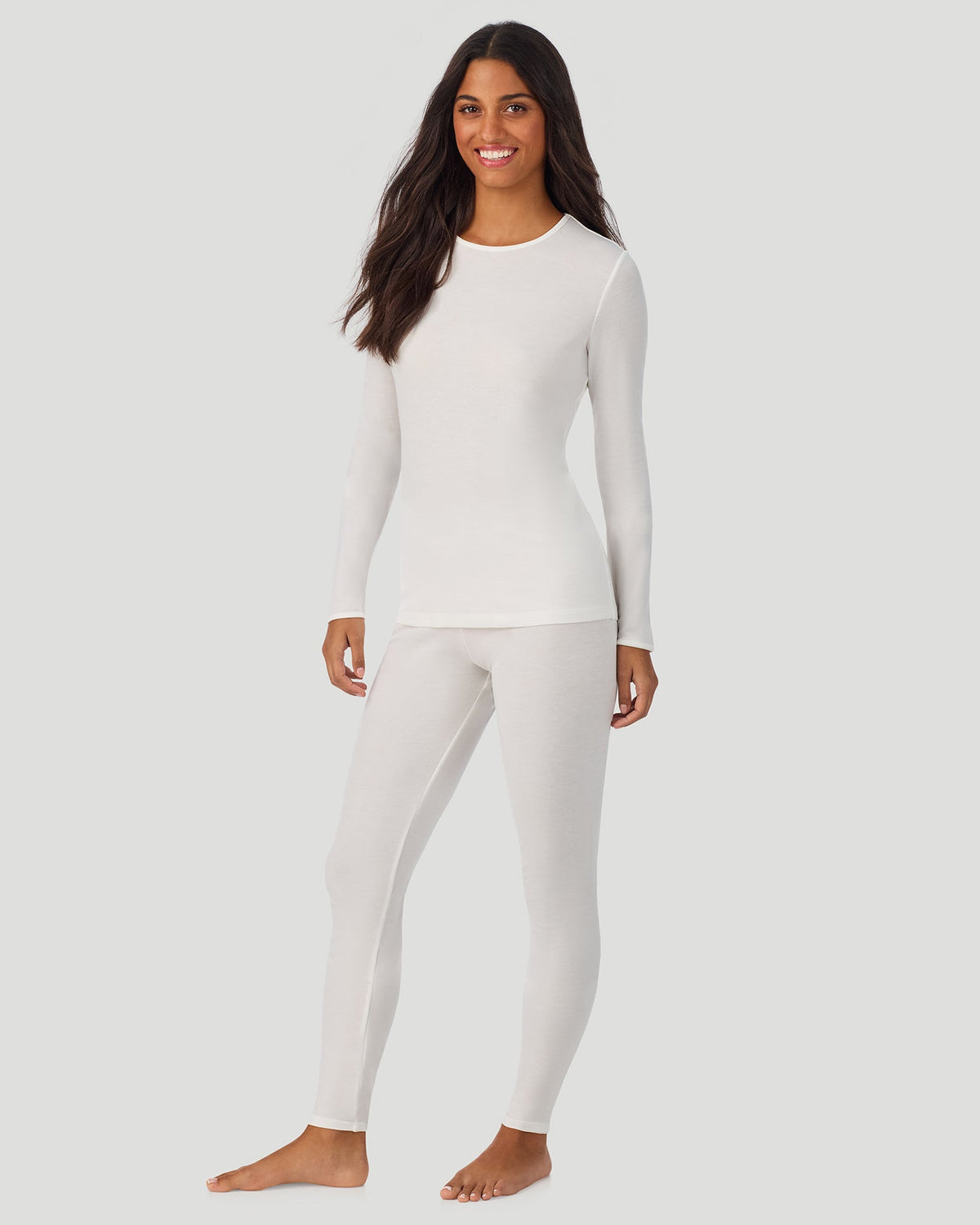 A lady wearing Softwear Long Sleeve Crew in Ivory side view side view