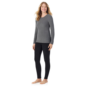 A lady wearing charcoal heather long sleeve crew