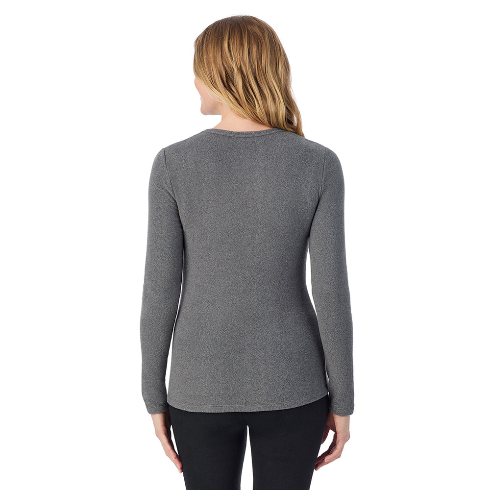 A lady wearing charcoal heather long sleeve crew