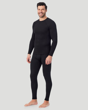 A man wearing a black X fleece long sleeve crew side pose