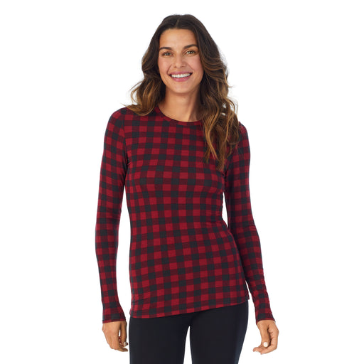 Red Buffalo; Model is wearing size S. She is 5’9”, Bust 34”, Waist 25.5”, Hips 36.5”. @A lady wearing a Red Buffalo long sleeve stretch crew.