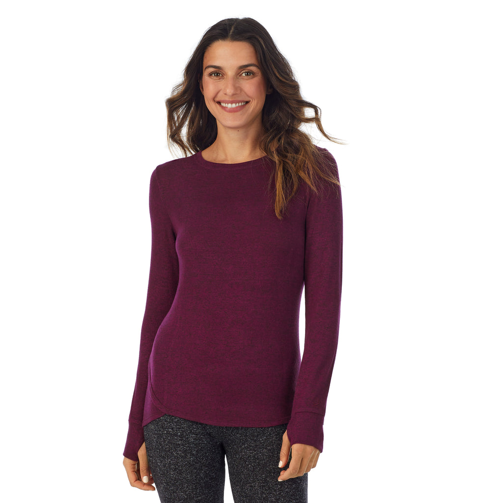 A lady wearing a marled purple beet long sleeve crew.