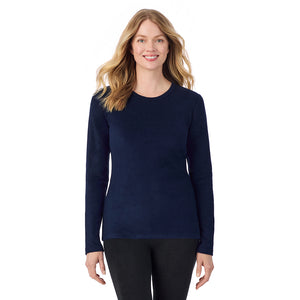 A lady wearing navy blazer long sleeve crew