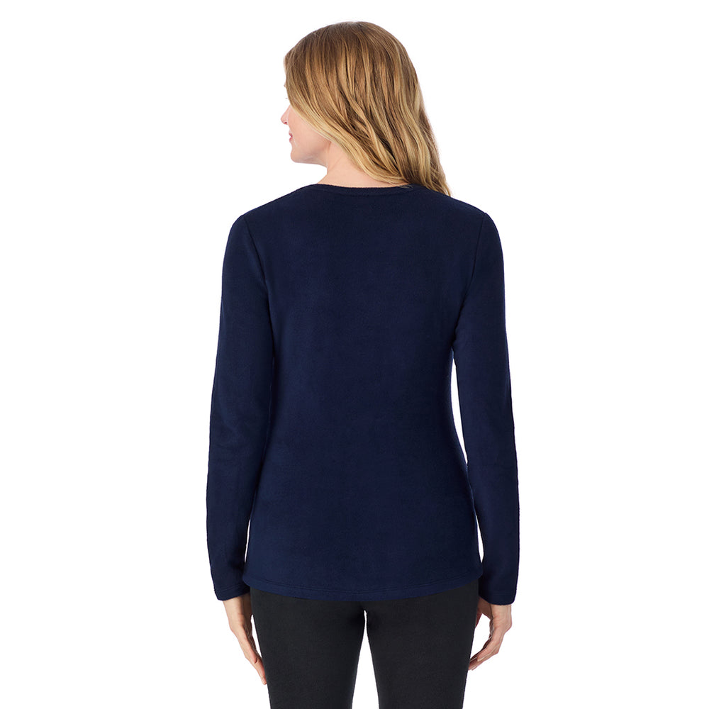 A Lady is wearing a Navy Blazer Fleecewear With Stretch Long Sleeve Crew PETITE
