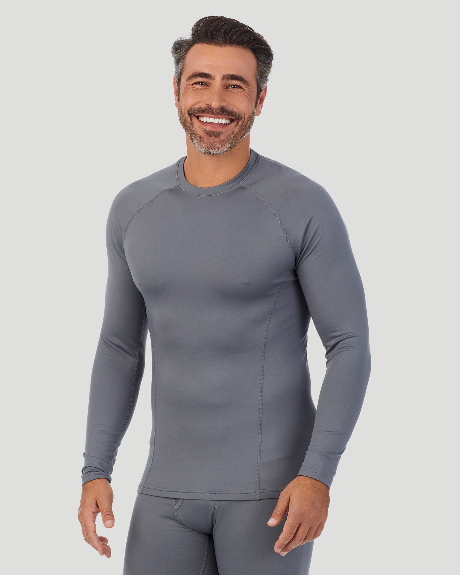 Black; Model is wearing size M. He is 5'11", Waist 32", Inseam 31".@A man wearing black long sleeve crew front pose.  !88% Polyester, 12% Spandex!