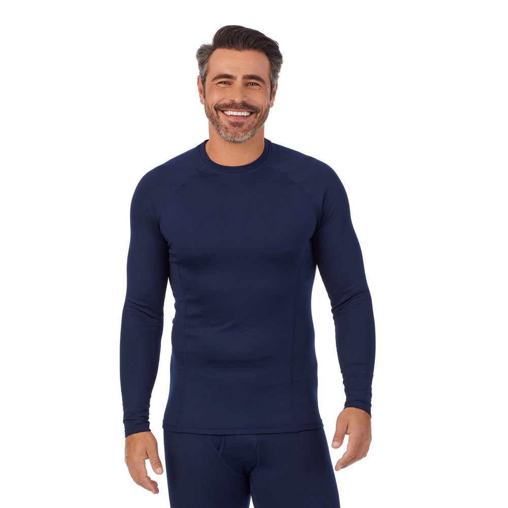 A man wearing navy blazer arcticore long sleeve crew. !88% Recycled Polyester, 12% Spandex!