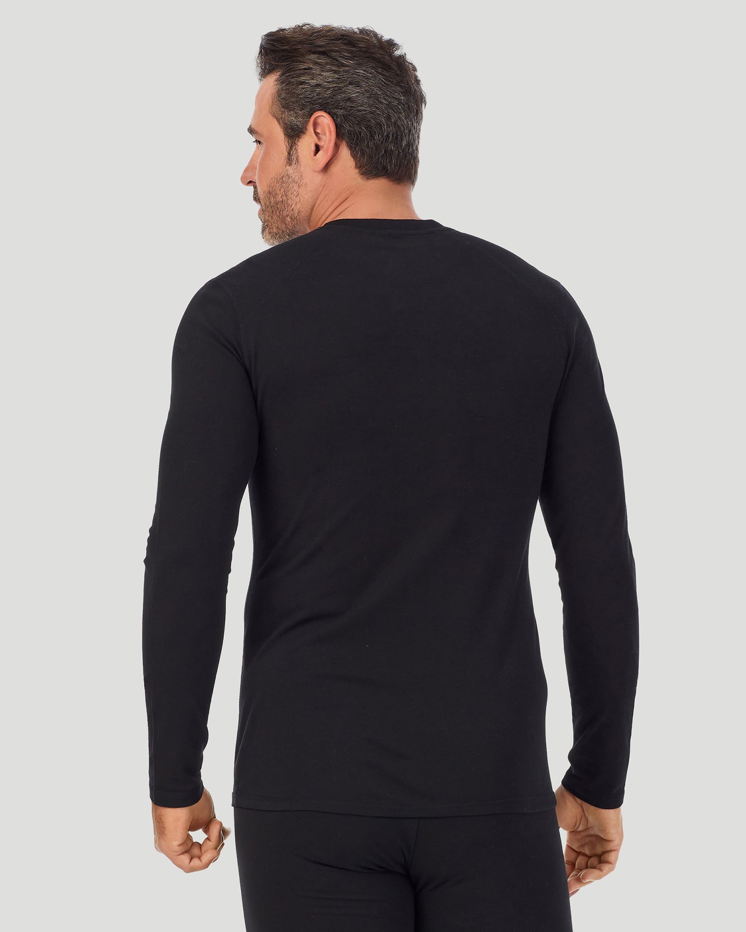 Black; Model is wearing size M. He is 6'2", Waist 32", Inseam 34". @A man wearing a black long sleeve crew