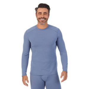 A man wearing a Light Denim long sleeve crew