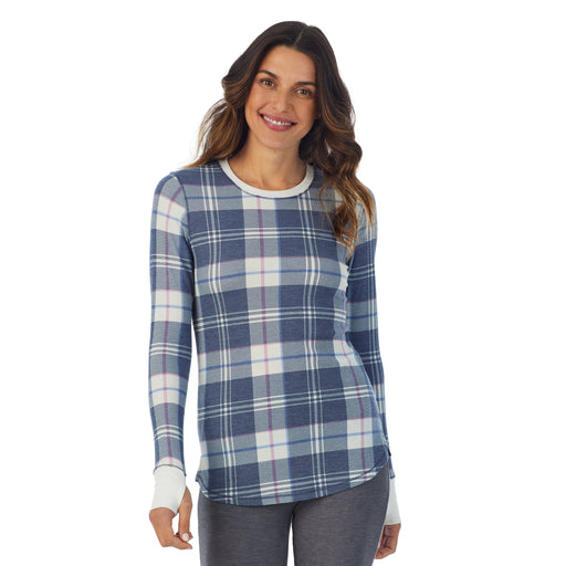  Blue Plaid; Model is wearing size S. She is 5’9”, Bust 34”, Waist 25.5”, Hips 36.5”. @A lady wearing a Blue Plaid long sleeve crew.