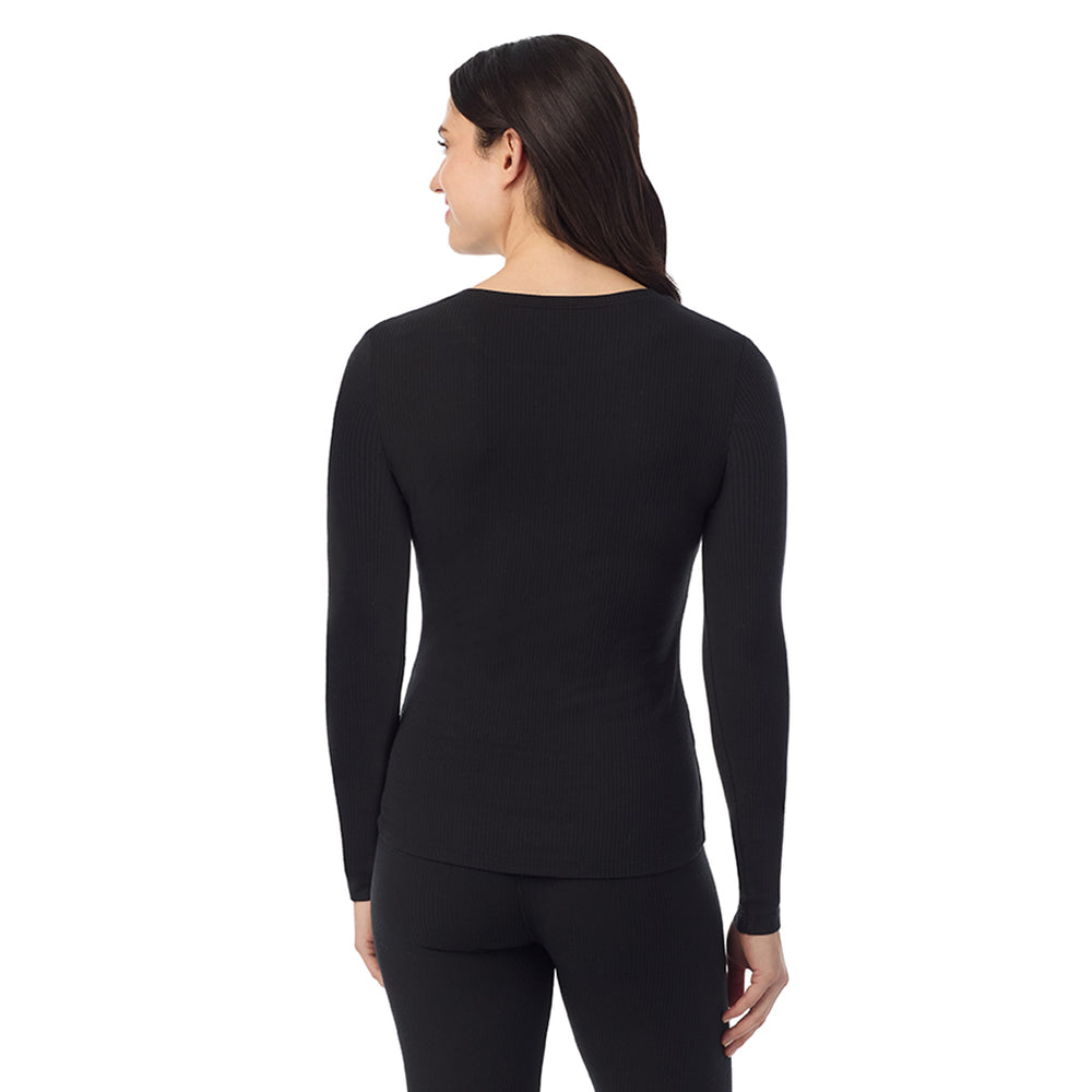 A Lady is wearing a Black Stretch Rib Long Sleeve Crew