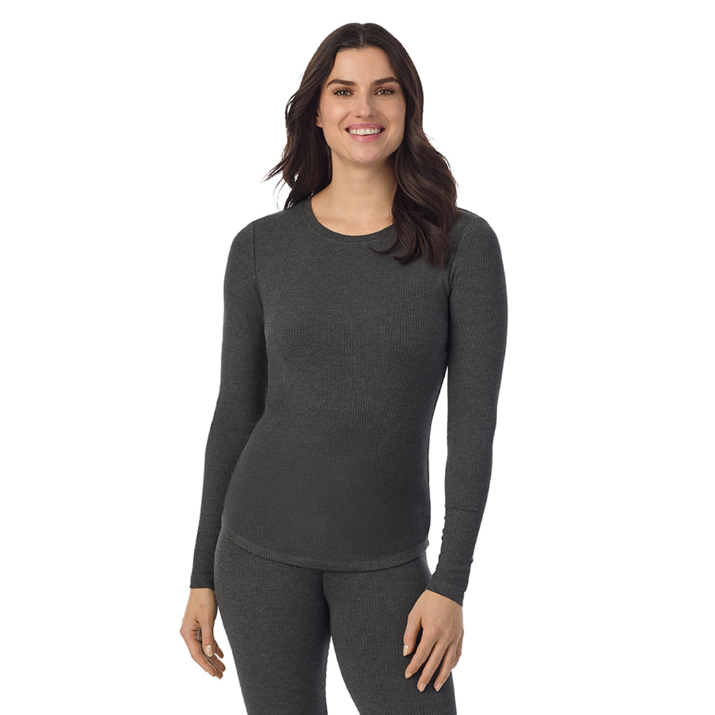  A Lady is wearing a Charcoal Heather Stretch Rib Long Sleeve Crew