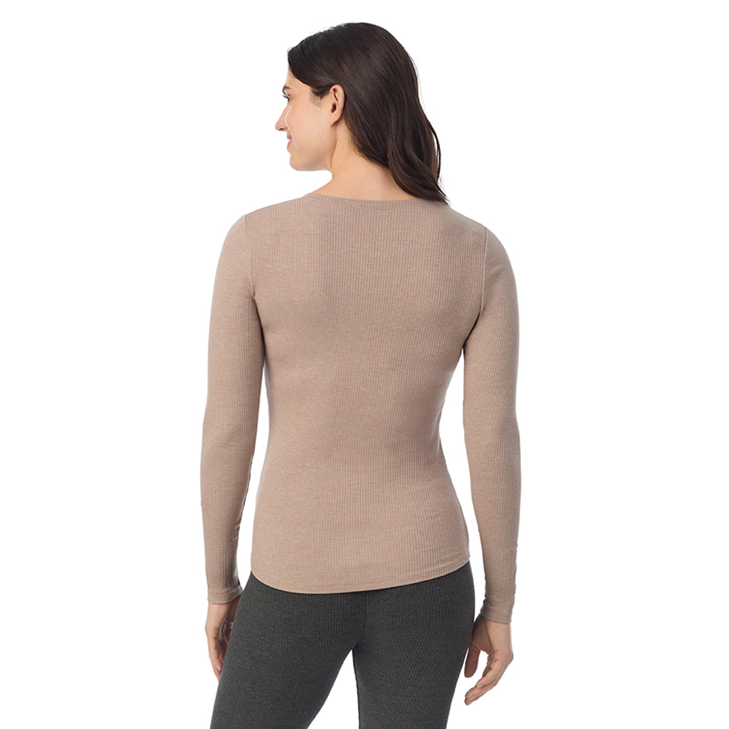  A Lady is wearing a Pecan Heather Stretch Rib Long Sleeve Crew