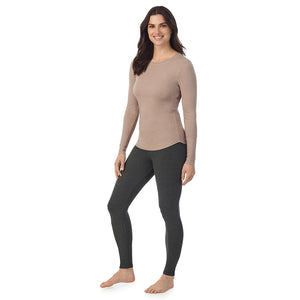  A Lady is wearing a Pecan Heather Stretch Rib Long Sleeve Crew