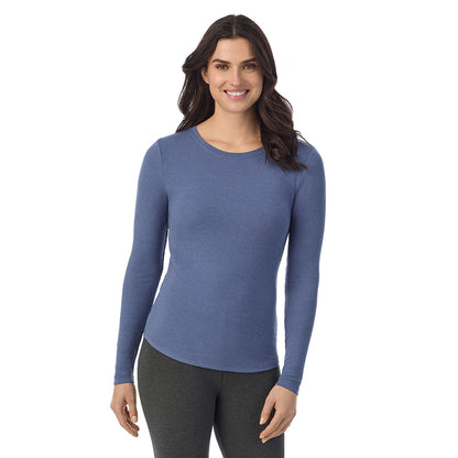 Smoke Blue Heather; Model is wearing a size S. She is 5’9”, Bust 34”, Waist 25”, Hips 36”@ A Lady is wearing a Smoke Blue Heather Stretch Rib Long Sleeve Crew