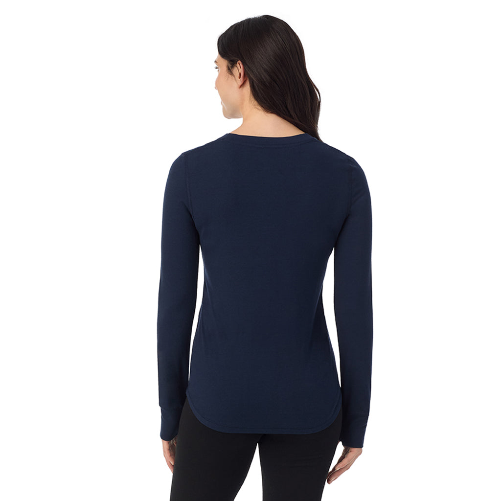 A lady wearing Navy Blazer cottonwear long sleeve scoop neck