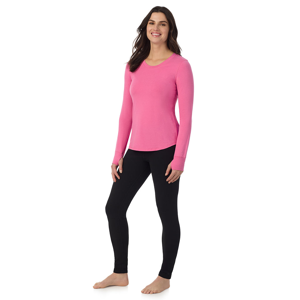 Fiji Pink; Model is wearing a size S. She is 5’9”, Bust 34”, Waist 25”, Hips 36”@A lady wearing Fiji Pink cottonwear long sleeve scoop neck