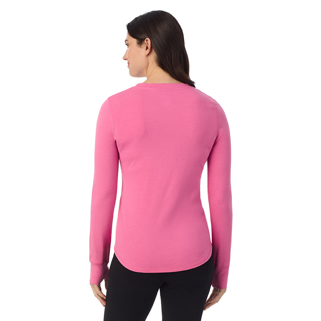 Fiji Pink; Model is wearing a size S. She is 5’9”, Bust 34”, Waist 25”, Hips 36”@A lady wearing Fiji Pink cottonwear long sleeve scoop neck