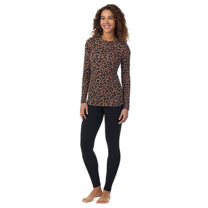 Pecan Animal; Model is wearing size S. She is 5’9”, Bust 34”, Waist 23”, Hips 35”. @A lady wearing pecan animal  longsleeve crew.