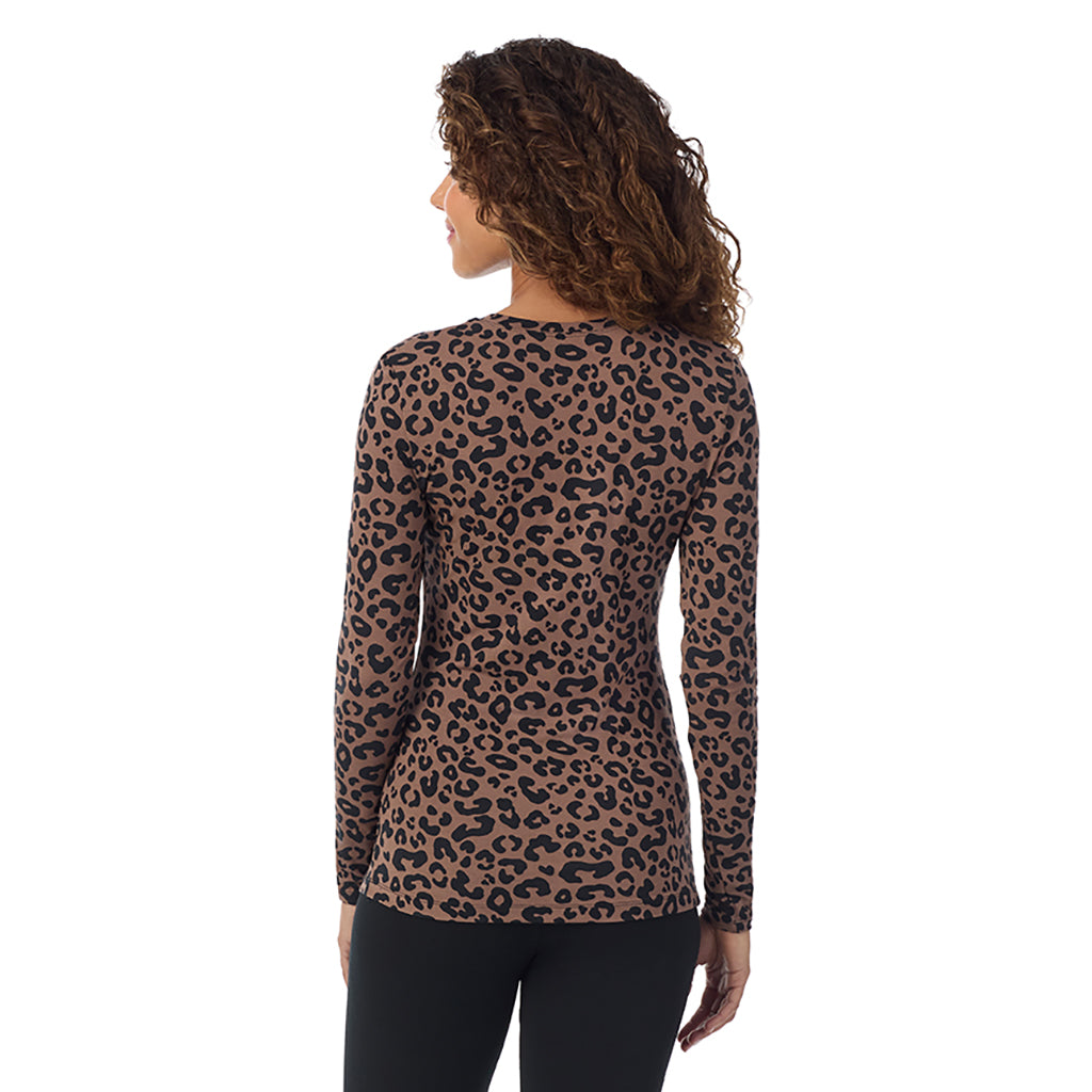 A lady wearing pecan animal  longsleeve crew.