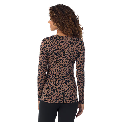 Pecan Animal; Model is wearing size S. She is 5’9”, Bust 34”, Waist 23”, Hips 35”. @A lady wearing pecan animal  longsleeve crew.