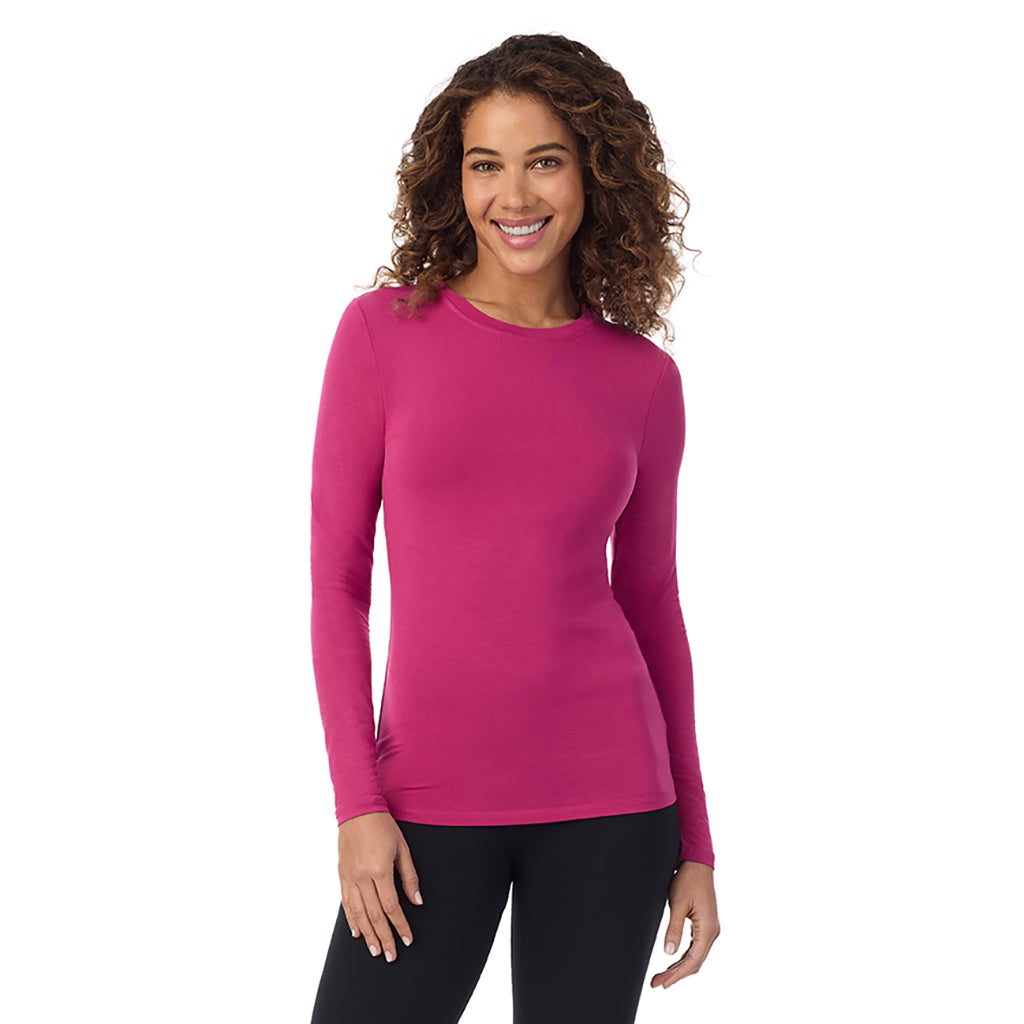 A lady wearing deep fuchsia  longsleeve crew.