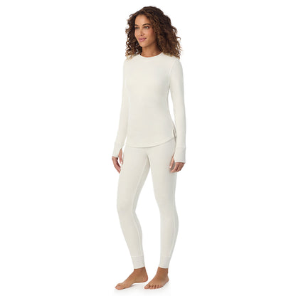 Ivory; Model is wearing size S. She is 5’9”, Bust 34”, Waist 23”, Hips 35”@ A Lady is wearing Ivory Cozy Stretch Thermal Long Sleeve Crew