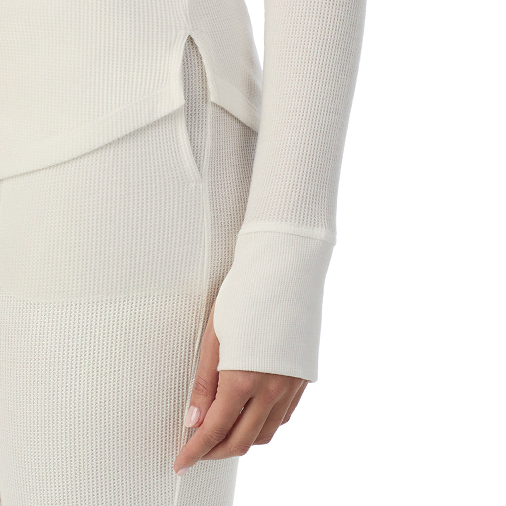 A lady wearing Cozy Stretch Thermal Long Sleeve Crew in Ivory close up close up