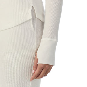 A lady wearing Cozy Stretch Thermal Long Sleeve Crew in Ivory close up close up