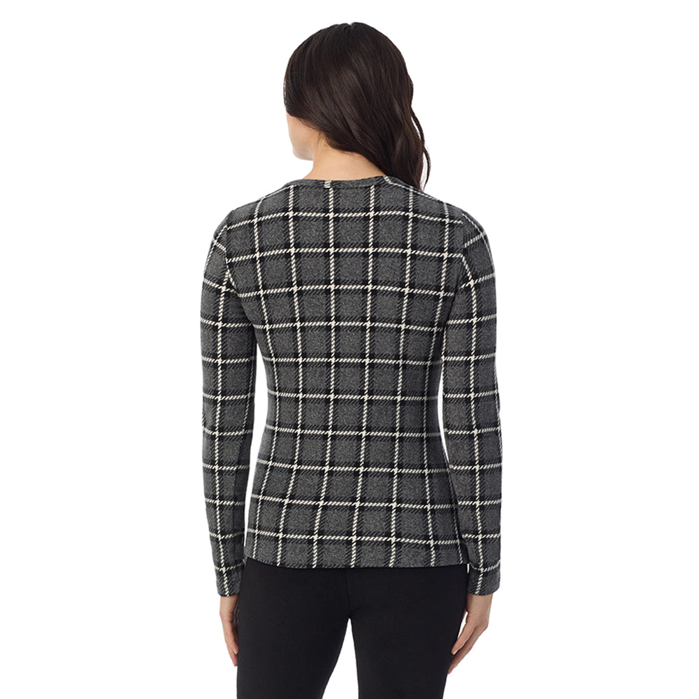 A Lady is wearing a gray black plaid Fleecewear With Stretch Long Sleeve Crew PETITE