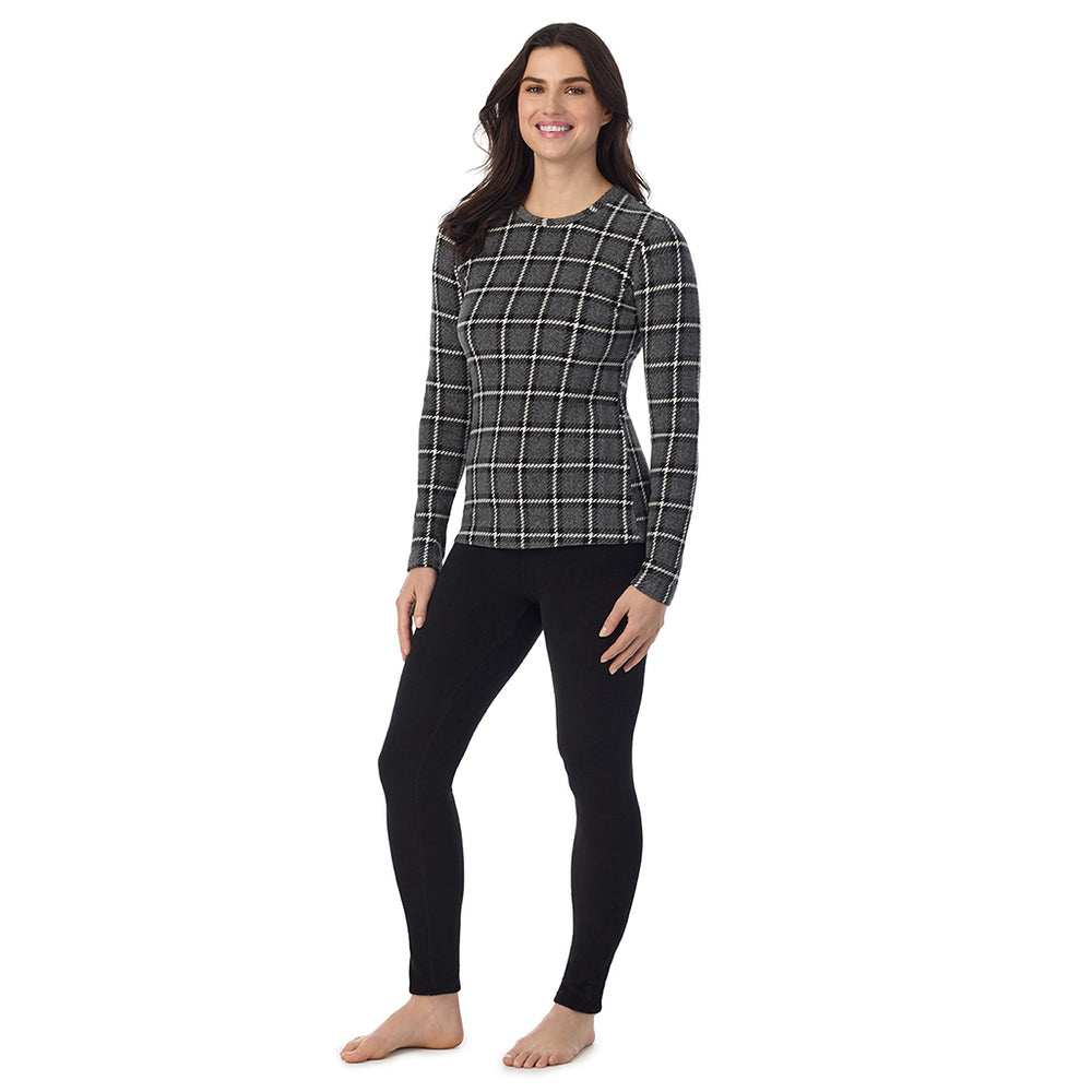 A Lady is wearing a gray black plaid Fleecewear With Stretch Long Sleeve Crew PETITE