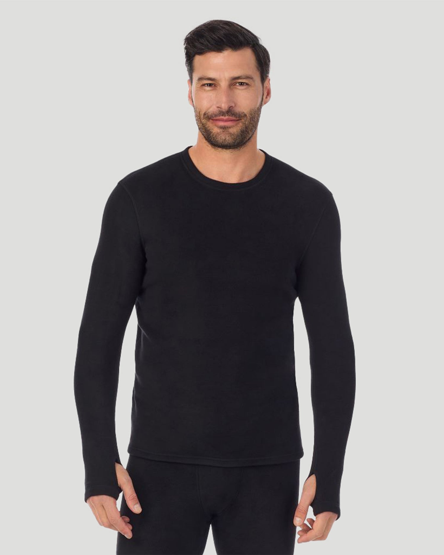 Black; Model is wearing a size M. He is 6’2”, Waist is 32”, Inseam 34”@A man wearing black long sleeve fleecewear crew.