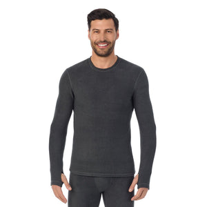 A man wearing black heather long sleeve fleecewear crew.
