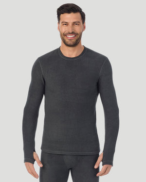 A man wearing black heather long sleeve fleecewear crew.
