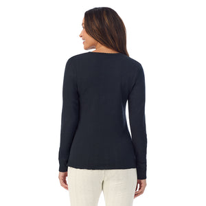 A lady is wearing Cotton Pointelle Long Sleeve Crew
