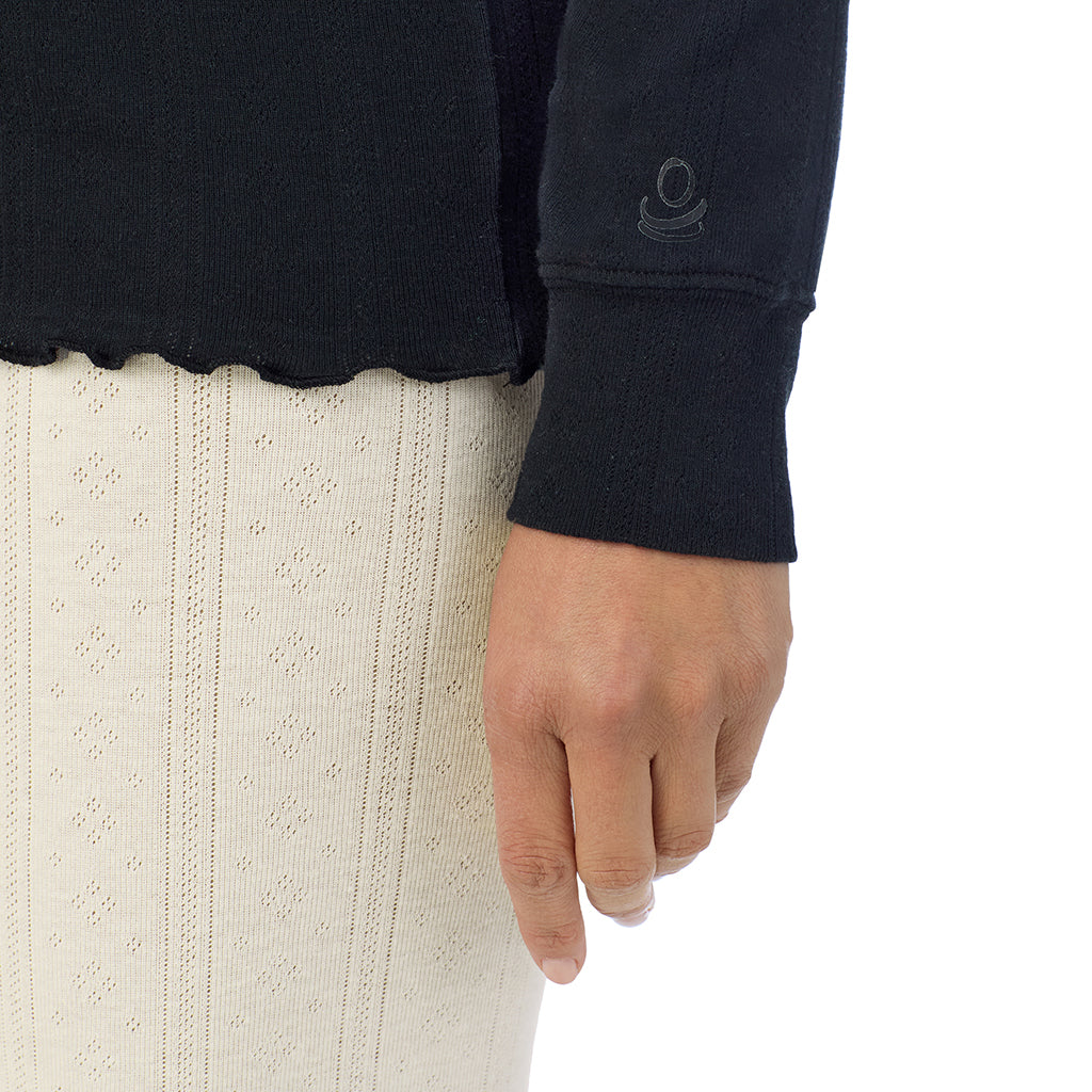 Black;Model is wearing size S. She is 5'8", Bust 34", Waist 24.5", Hips 35".@A lady is wearing Cotton Pointelle Long Sleeve Crew
