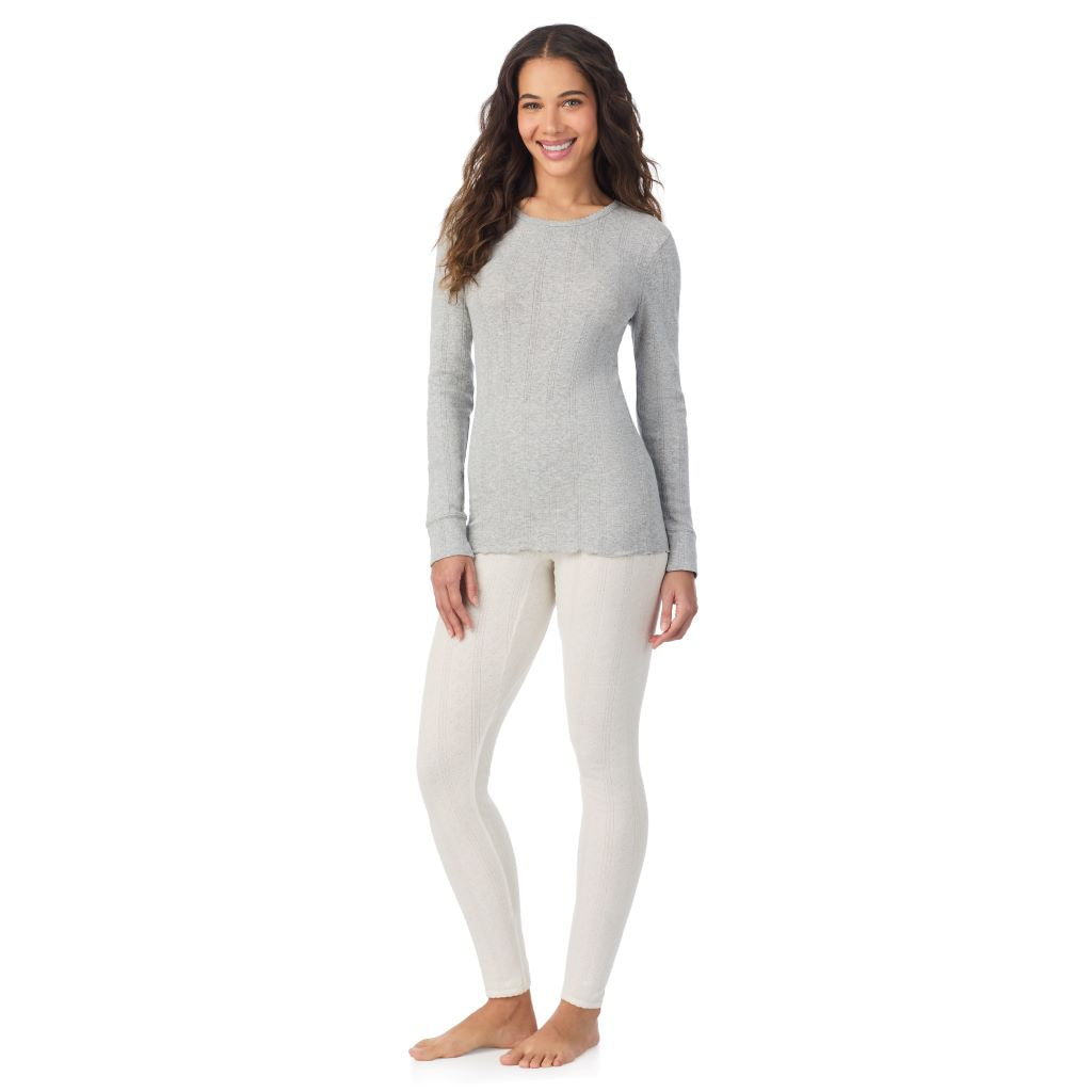 A lady is wearing Cotton Pointelle Long Sleeve Crew
