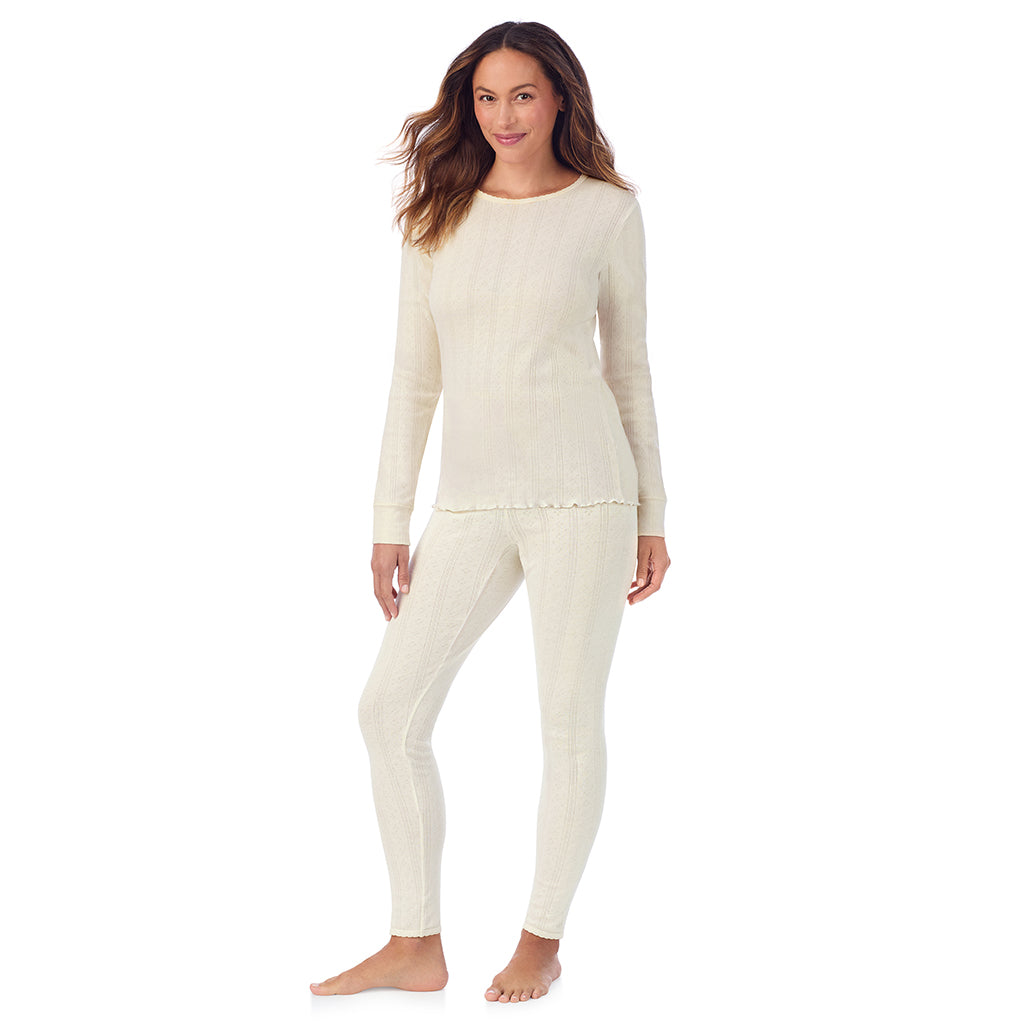 Ivory;Model is wearing size S. She is 5'8", Bust 34", Waist 24.5", Hips 35".@A lady is wearing Cotton Pointelle Long Sleeve Crew
