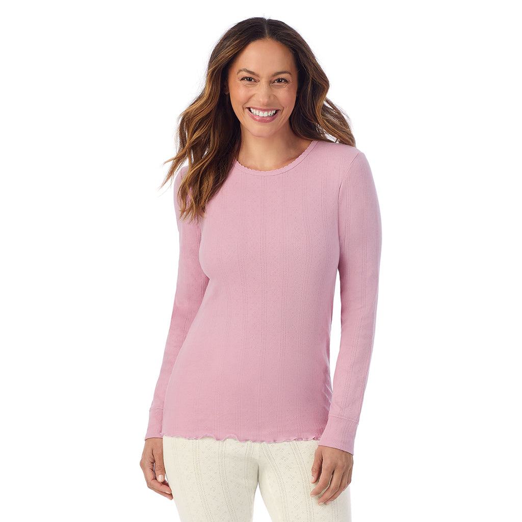 A lady is wearing Cotton Pointelle Long Sleeve Crew
