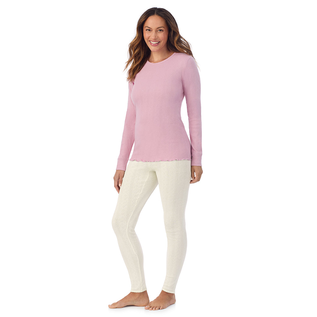 A lady is wearing Cotton Pointelle Long Sleeve Crew
