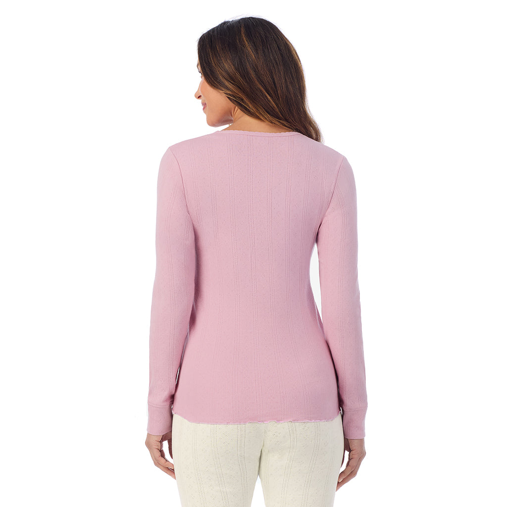 A lady is wearing Cotton Pointelle Long Sleeve Crew
