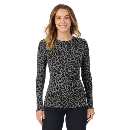 Charcoal Leopard; Model is wearing size S. She is 5'11.5", Bust 34", Waist 26", Hips 37". @A lady wearing a charcoal leopard long sleeve stretch crew.