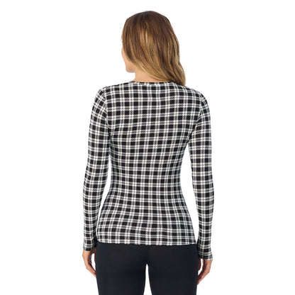 Ivory/Black Plaid; Model is wearing size S. She is 5'11.5", Bust 34", Waist 26", Hips 37". @A lady wearing a ivory/black plaid long sleeve stretch crew.