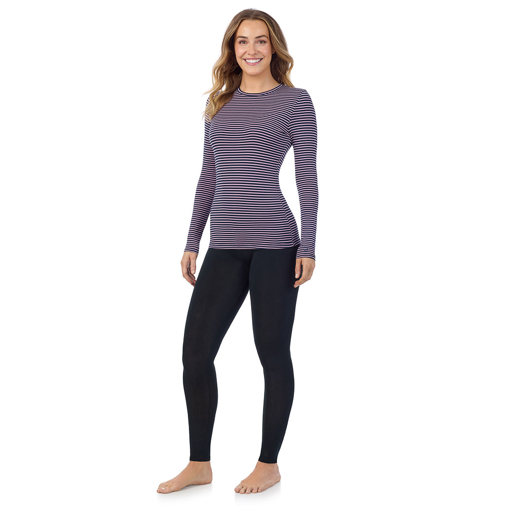 A lady wearing a mauve/navy stripe long sleeve stretch crew.