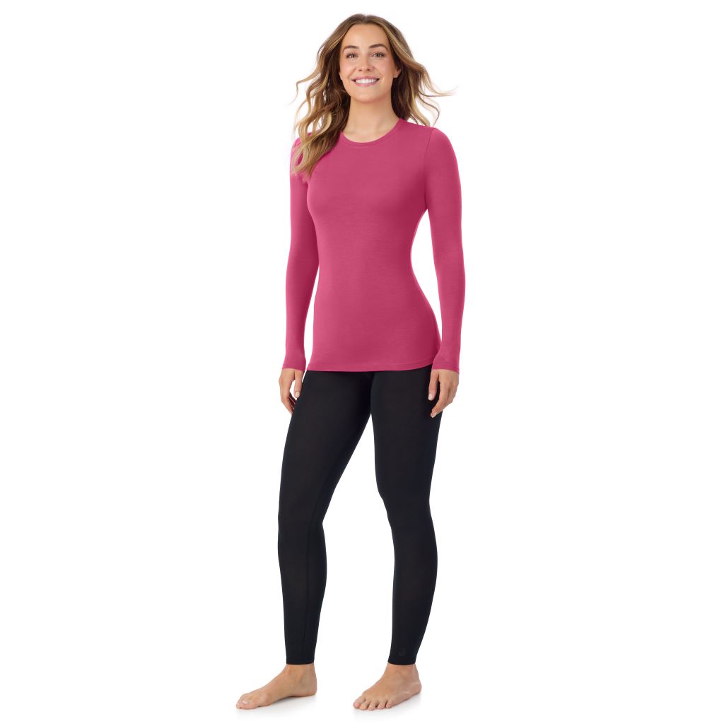 A lady wearing a very berry long sleeve stretch crew.