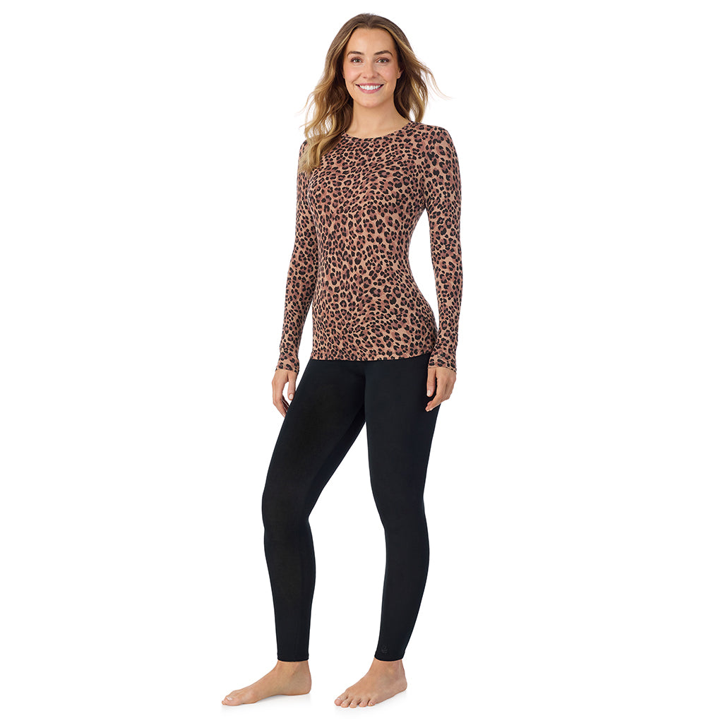 A lady wearing a taupe leopard long sleeve stretch crew.