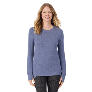  A Lady is wearing Marled Velvet Blue Soft Knit Long Sleeve Crew