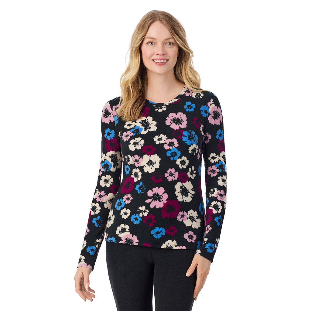 A lady wearing Black Floral long sleeve crew