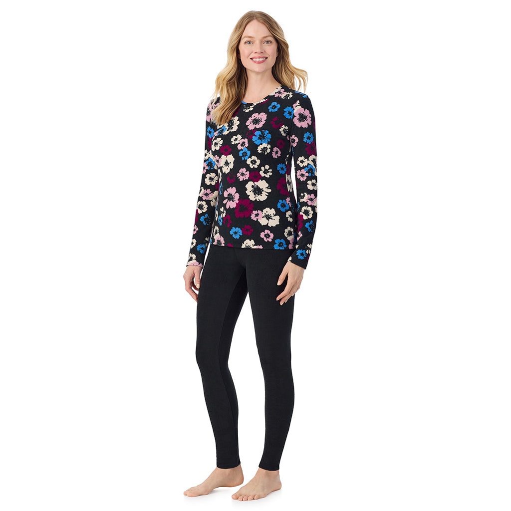 Black Floral; Model is wearing size S. She is 5'11", Bust 33", Waist 24", Hips 34".@A lady wearing Black Floral long sleeve crew